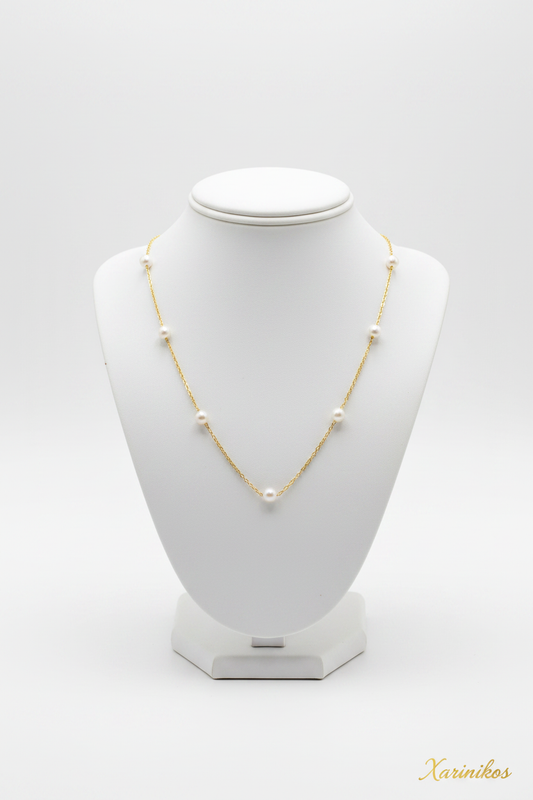 Handcrafted Steel Pearl Necklace on jewelry display stand