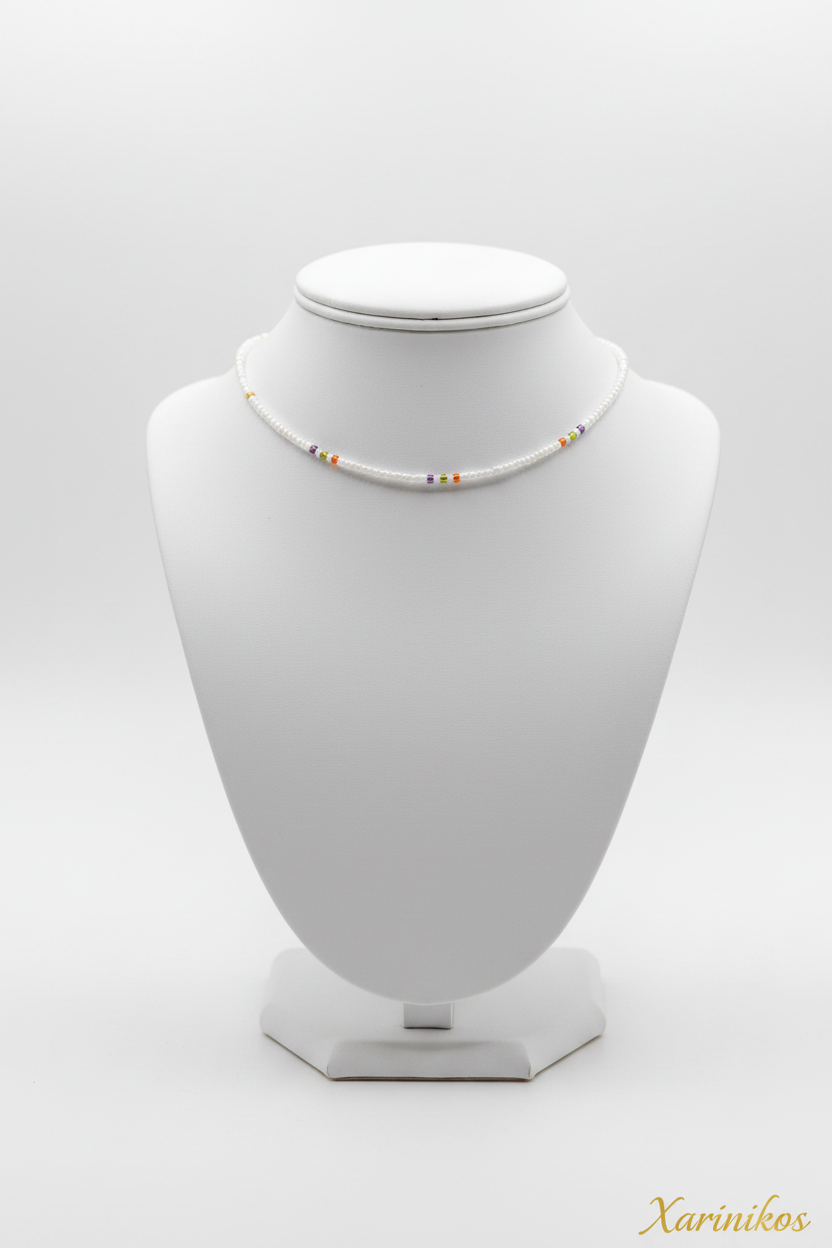 White Rainbow Seed Bead Choker on jewelry display